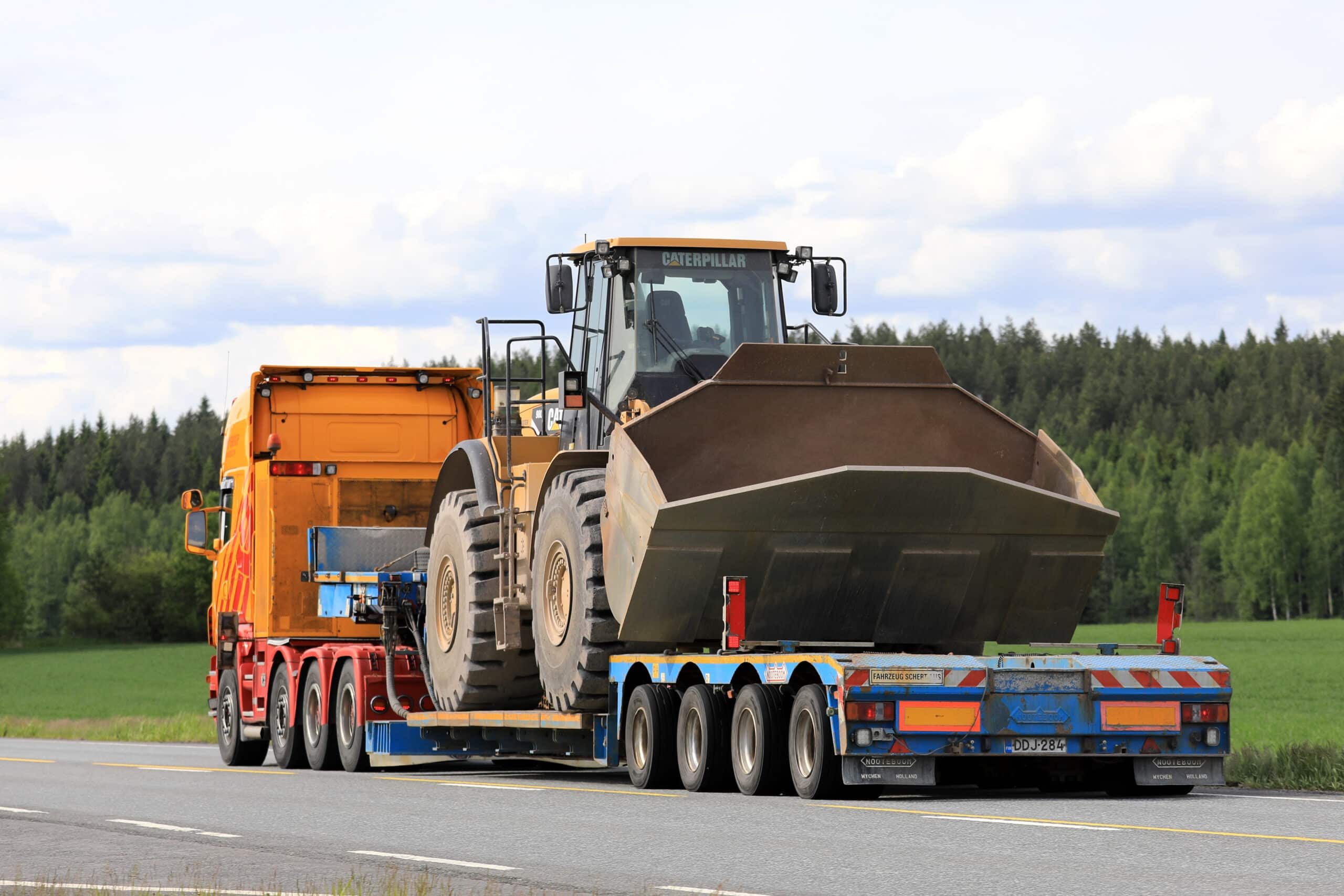 Semi Trailer Hauls Large Cat Wheel Loader